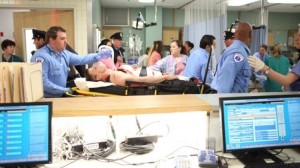 BONES:   Booth (David Boreanaz, C) is rushed to the hospital after receiving multiple gunshot wounds in the "The Recluse in the Recliner" Season Finale episode of BONES airing Monday, May 19 (8:00-9:00 PM ET/PT) on FOX.  ©2014 Fox Broadcasting Co.  Cr:  Adam Taylor/FOX